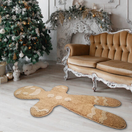 Weihnachtslebkuchen-Mann, der Teppich beflockt